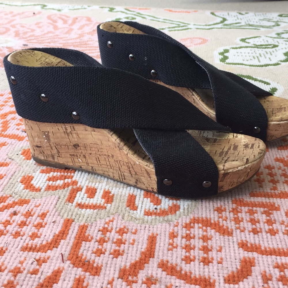 Women’s pair of high hilled wedges